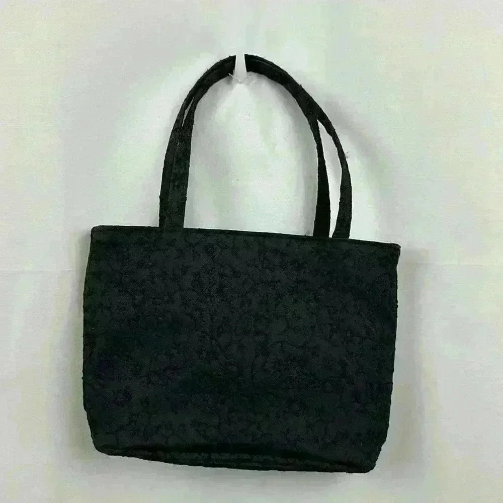 Saks Fifth Ave black tote with inner zipper pouch.